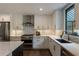 This updated kitchen has stainless steel appliances, white cabinets, and a patterned backsplash, combining style with functionality at 270 Shady Marsh Trl, Roswell, GA 30075
