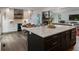 Spacious kitchen with stainless appliances, wine cooler, large island and dining area at 270 Shady Marsh Trl, Roswell, GA 30075