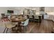 Open concept kitchen and dining area with stainless steel appliances and hardwood flooring at 270 Shady Marsh Trl, Roswell, GA 30075