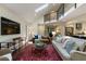 Bright, open living room with high ceilings, modern staircase, and stylish furnishings at 270 Shady Marsh Trl, Roswell, GA 30075