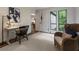 Bright office space featuring a stylish desk, comfortable chair, and natural light, perfect for a productive work environment at 270 Shady Marsh Trl, Roswell, GA 30075