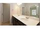Bathroom featuring double sinks with modern fixtures and a large mirror at 3220 Creole Ln, Avondale Estates, GA 30002