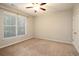 Bright bedroom with carpet, window, and ample closet space at 3220 Creole Ln, Avondale Estates, GA 30002
