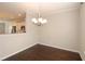 Cozy dining area offers views into the modern kitchen at 3220 Creole Ln, Avondale Estates, GA 30002