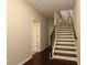 Entryway featuring hardwood floors, staircase, and neutral paint at 3220 Creole Ln, Avondale Estates, GA 30002