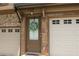 Inviting front entryway with stone accents and a decorative wreath at 3220 Creole Ln, Avondale Estates, GA 30002