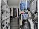 Well-organized walk-in closet with custom shelving, hanging rods, and plenty of storage space at 3668 Burel Mill Dr, Buford, GA 30519