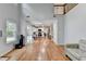 Open-concept living room with hardwood floors and a view of the kitchen at 3668 Burel Mill Dr, Buford, GA 30519