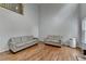 Bright living room featuring high ceilings, hardwood floors and comfortable seating at 3668 Burel Mill Dr, Buford, GA 30519