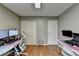 Home office featuring a door to the outside and neutral walls; great for working at home at 3668 Burel Mill Dr, Buford, GA 30519