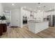 Modern kitchen features stainless steel appliances, granite countertops, and a center island at 5121 Aster Bnd, Canton, GA 30114