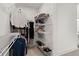 Organized walk-in closet featuring shelves and clothing racks for optimal storage at 5121 Aster Bnd, Canton, GA 30114