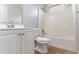 Bathroom features a vanity, toilet, and shower/tub combo at 7074 Springgrove Ct, Austell, GA 30168