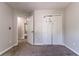 Bedroom features neutral walls, carpet, and closet at 7074 Springgrove Ct, Austell, GA 30168