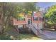 Charming two-story home with attached two-car garage and inviting front porch at 7074 Springgrove Ct, Austell, GA 30168