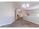 Spacious living room with carpeted floors and neutral walls at 7074 Springgrove Ct, Austell, GA 30168
