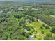 Panoramic aerial view of multiple houses and large fields at 105 Tranquility Dr, Villa Rica, GA 30180