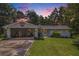 Charming single-story home with a lovely front yard and attached carport, perfect for suburban living at 105 Tranquility Dr, Villa Rica, GA 30180