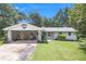 Beautifully maintained front yard with a well-kept lawn and a welcoming facade at 105 Tranquility Dr, Villa Rica, GA 30180