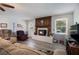 Comfortable living room with a brick fireplace, offering a relaxing and inviting atmosphere at 105 Tranquility Dr, Villa Rica, GA 30180