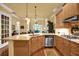 Spacious kitchen with granite countertops, stainless steel appliances, and hardwood floors at 1203 Glenridge Ne Pl, Atlanta, GA 30342