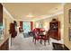 Open-concept living room with hardwood floors, a fireplace, and access to an outdoor patio at 1203 Glenridge Ne Pl, Atlanta, GA 30342