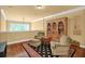 Cozy upstairs living area featuring comfortable seating, hardwood floors, and built-in shelving at 1203 Glenridge Ne Pl, Atlanta, GA 30342