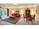 Inviting living room with plush seating, decorative rug, and charming dining area at 1203 Glenridge Ne Pl, Atlanta, GA 30342
