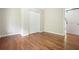 Bedroom featuring hardwood floors and a closet to maximize storage space at 175 Smith Ferguson Rd, Dallas, GA 30157