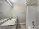 Well-lit bathroom featuring granite counters, a framed mirror, and a shower, offering modern comfort at 3508 Sweetgum Ln, Decatur, GA 30032