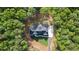 A beautiful new construction home is nestled in a private, wooded lot with long driveway and fresh sod at 5567 Tyree Rd, Winston, GA 30187