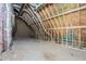Unfinished attic showing roofline, stud framing, and ductwork offering potential for expansion or storage at 5567 Tyree Rd, Winston, GA 30187