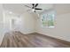 Bedroom featuring hardwood floors, large windows, and ample natural light at 5567 Tyree Rd, Winston, GA 30187