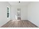 Bedroom featuring beautiful wood floors and an ensuite bathroom at 5567 Tyree Rd, Winston, GA 30187