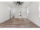Spacious bedroom with modern ceiling fan and hardwood floors at 5567 Tyree Rd, Winston, GA 30187