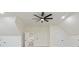 Bright bonus room with large dark fan and access to other rooms in the house at 5567 Tyree Rd, Winston, GA 30187