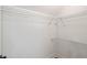 Walk-in closet featuring white wire shelving and neutral walls at 5567 Tyree Rd, Winston, GA 30187