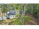 Modern farmhouse surrounded by woods with natural light at 5567 Tyree Rd, Winston, GA 30187