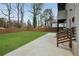 Spacious backyard featuring a well-maintained lawn and a concrete patio, ideal for outdoor activities at 1355 Lockwood Sw Dr, Atlanta, GA 30311