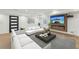 Stylish basement featuring a modern fireplace, comfortable seating, and contemporary decor for a cozy retreat at 1355 Lockwood Sw Dr, Atlanta, GA 30311