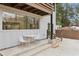 Cozy patio area with an outdoor dining set, perfect for entertaining and enjoying outdoor living at 1355 Lockwood Sw Dr, Atlanta, GA 30311