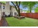 Backyard featuring a tree, wooden fence, and patio furniture at 2908 Woodruff Se Dr, Smyrna, GA 30080
