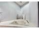 Relaxing bathroom featuring a soaking tub and neutral decor at 2908 Woodruff Se Dr, Smyrna, GA 30080