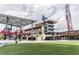 Exterior shot of the Atlanta Braves stadium area with grassy field and modern architecture at 2908 Woodruff Se Dr, Smyrna, GA 30080