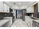 Well-equipped kitchen with stainless steel appliances, and ample cabinet space at 2908 Woodruff Se Dr, Smyrna, GA 30080