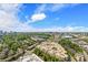 Scenic aerial view of the city, lake, and trees at 361 17Th Nw St # 2607, Atlanta, GA 30363