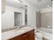 Bathroom with granite countertop and a bathtub at 361 17Th Nw St # 2607, Atlanta, GA 30363