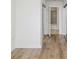 Hallway with wood flooring and a view to the bathroom at 361 17Th Nw St # 2607, Atlanta, GA 30363