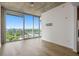 Spacious living room boasting floor to ceiling windows and beautiful city views at 361 17Th Nw St # 2607, Atlanta, GA 30363