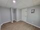 Finished basement featuring laminate flooring, neutral paint, and closet at 3796 Leesburg Sw Ct, Atlanta, GA 30331